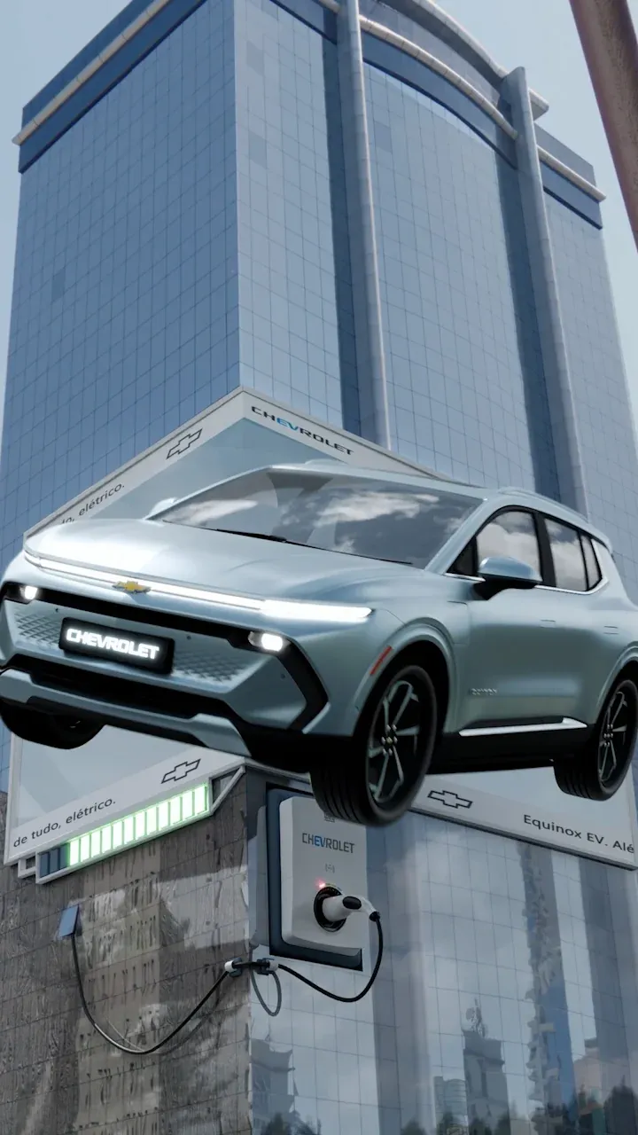 FOOH: SUV elétrico da Chevrolet emergindo da fachada de um prédio, com estação de recarga e indicador de bateria